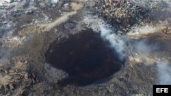 Cráter provocado por las explosiones en el puerto chino de Tianjin.