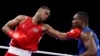 Loren Berto Alfonso Domínguez, representando a Azerbaiyán, en acción contra Julio César la Cruz Peraza, de Cuba. (Reuters/Peter Cziborra)