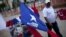 Detalle de una bandera de la campaña del candidato presidencial Juan Orlando Hernández, del conservador Partido Nacional, hoy, sábado 23 de noviembre de 2013, en Tegucigalpa (Honduras). Los hondureños votarán mañana domingo por un presidente, tres designa