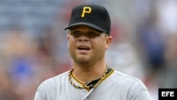  El abridor dominicano de los Piratas de Pittsburgh, Wandy Rodríguez, durante un partido de la competición de la Liga Nacional disputado contra los Bravos de Atlanta, en Atlanta (Georgia), Estados Unidos. 