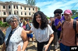 Anna Sofia Benitez Silvente y su madre Caridad Silvente