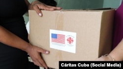 Entrega de ayuda humanitaria de EEUU en Villa Clara y Cienfuegos.