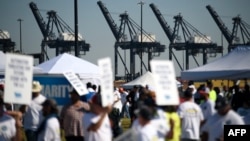 Dockworkers strike at the Bayport Container Terminal in Seabrook, Texas, on October 1, 2024.