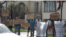 Imagen de los doce activistas protestando frente a la sede de la Asamblea Nacional del Poder Popular en el municipio Playa, Ciudad Habana.